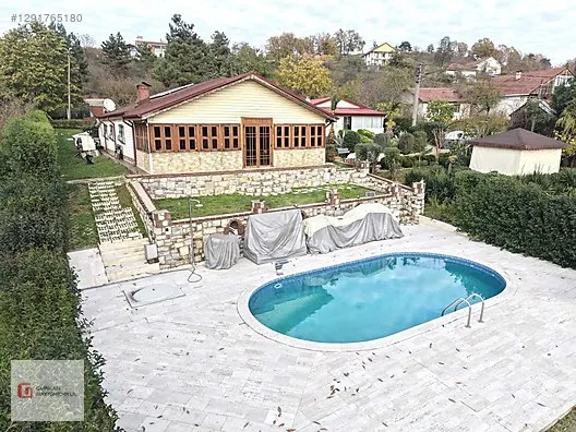 GÜRKAN GAYRİMEKUL BAYRAKTEPE MH. SATILIK HAVUZLU VİLLA